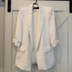 White blazer and pant suit